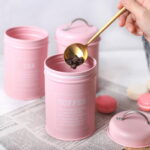 pink coffee and tea canisters